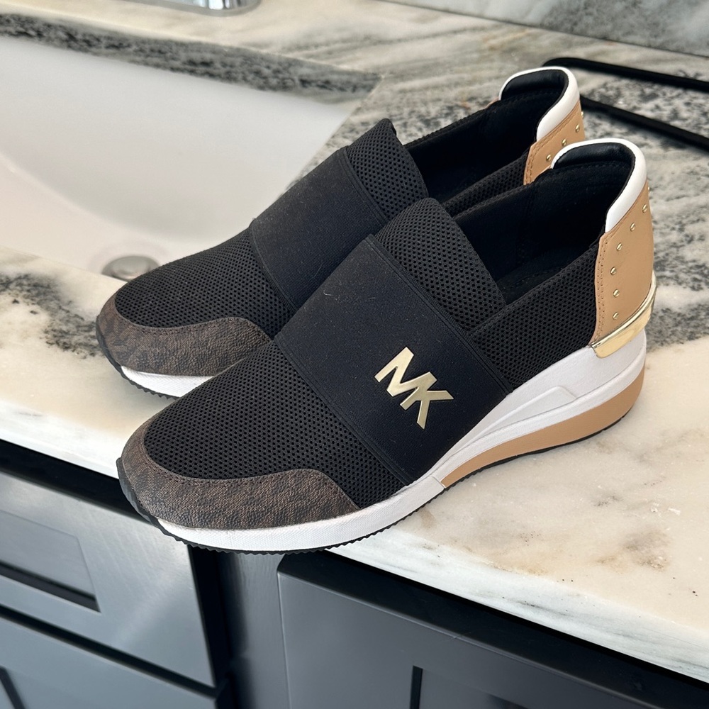 Michael Kors Women’s Black and Tan Slip-On Sneakers